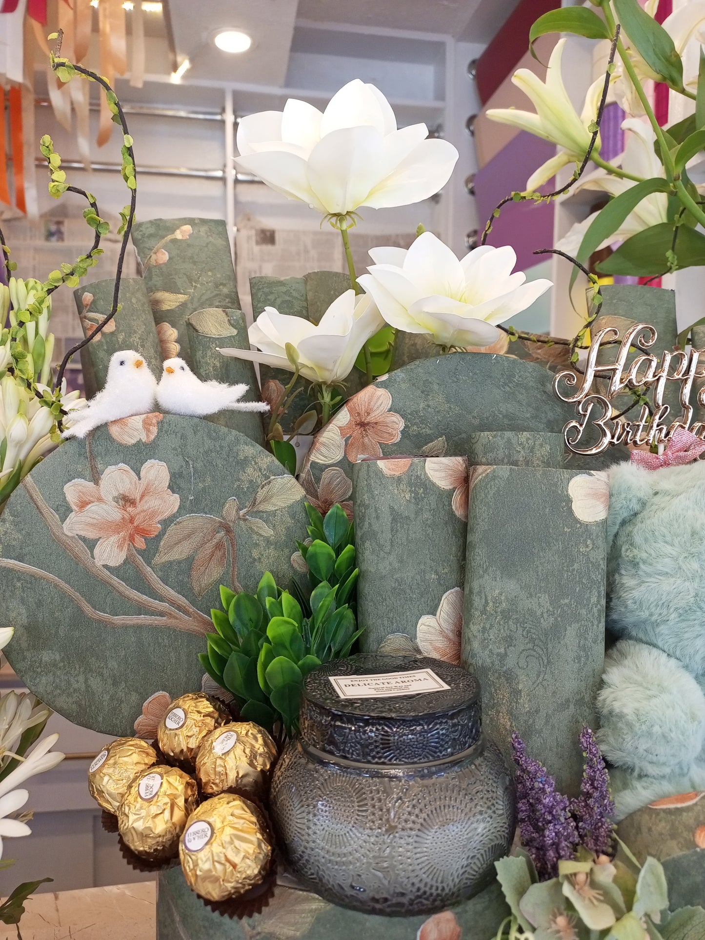 Green Chocolate Gift Basket with Teddy Bear, Fragrance Candle, Sparrows & Artificial Lily