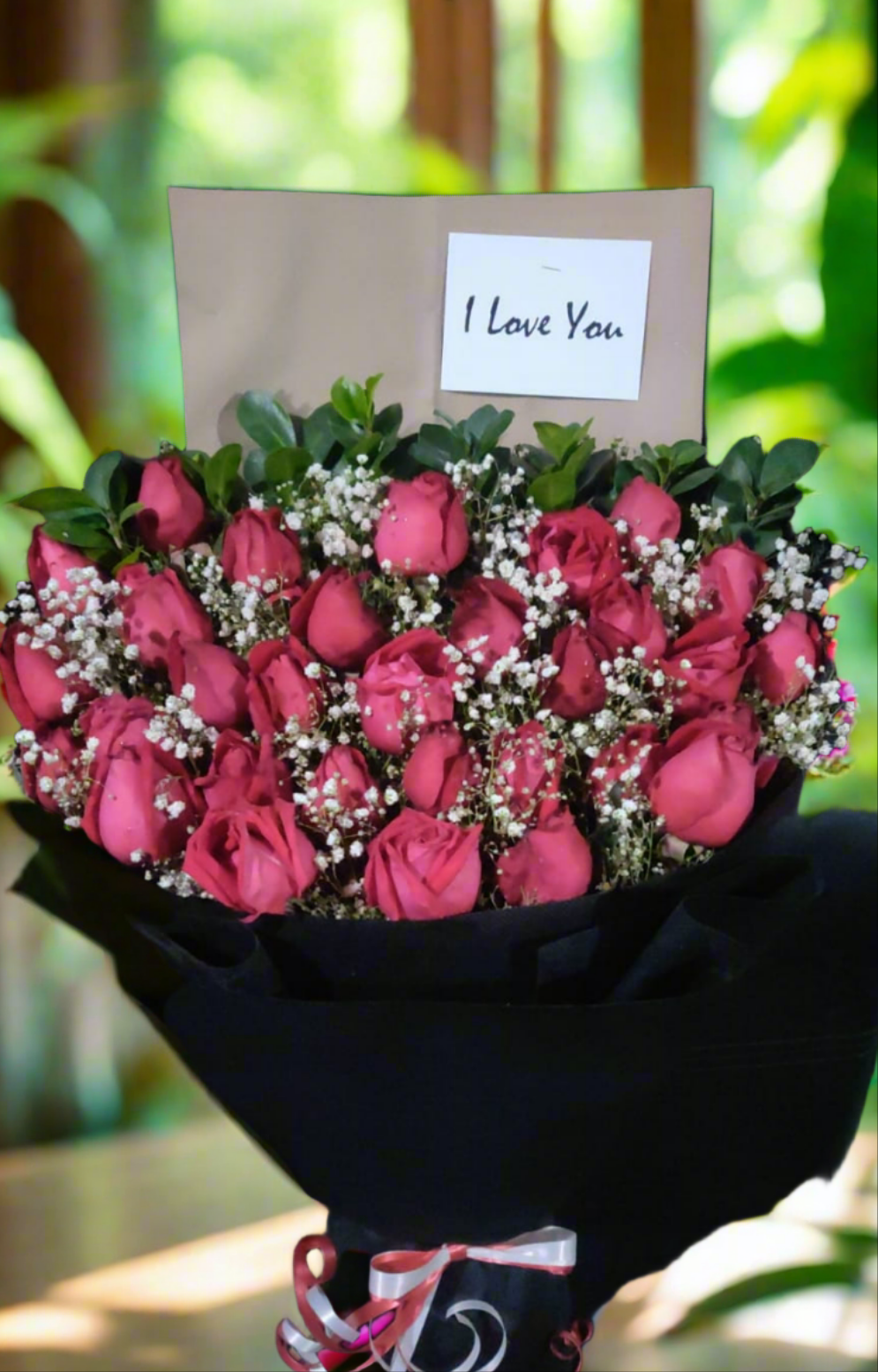 Rose flower with baby's breath bouquet