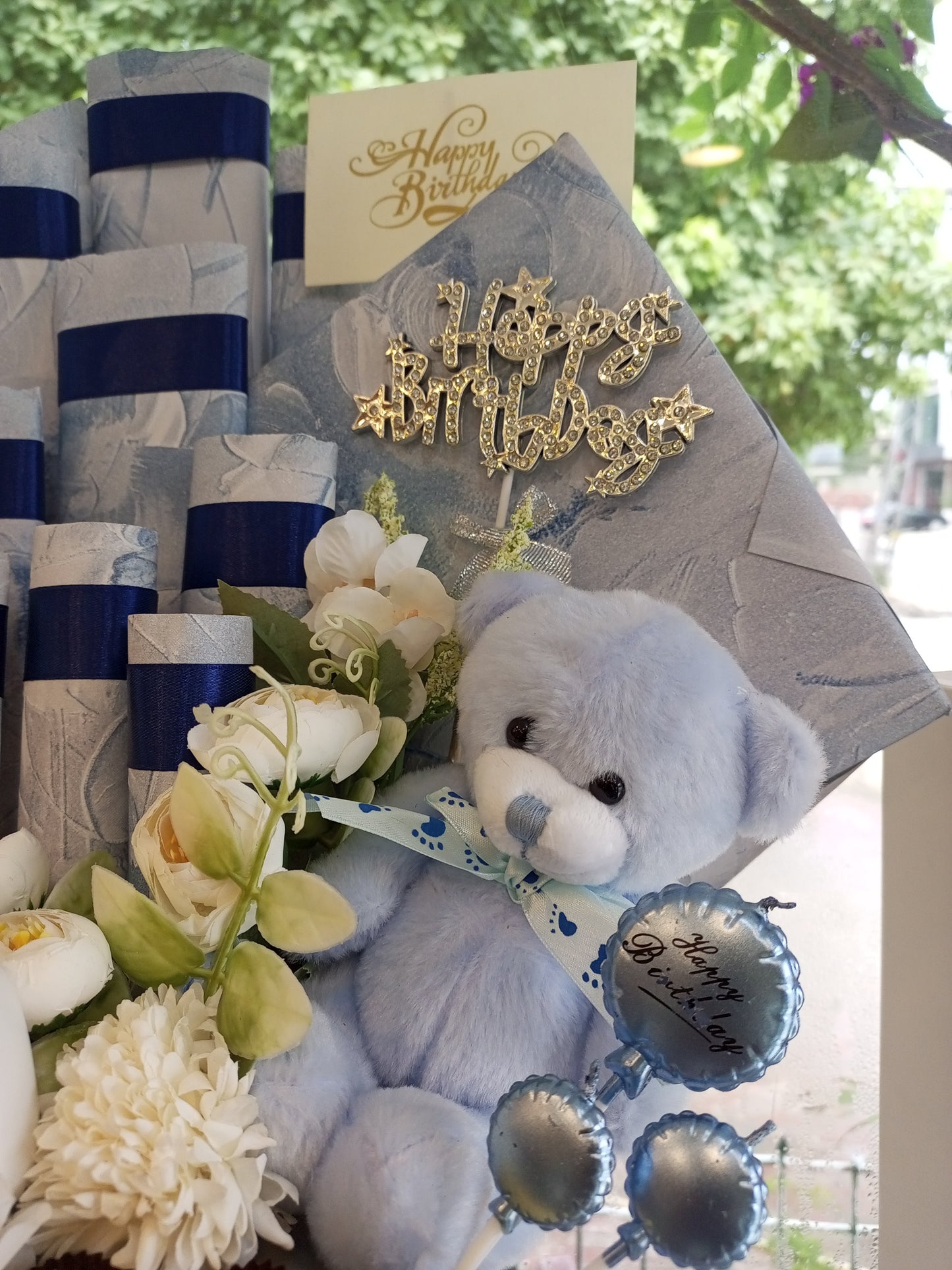 Chocolate basket with teddy bear and a cup