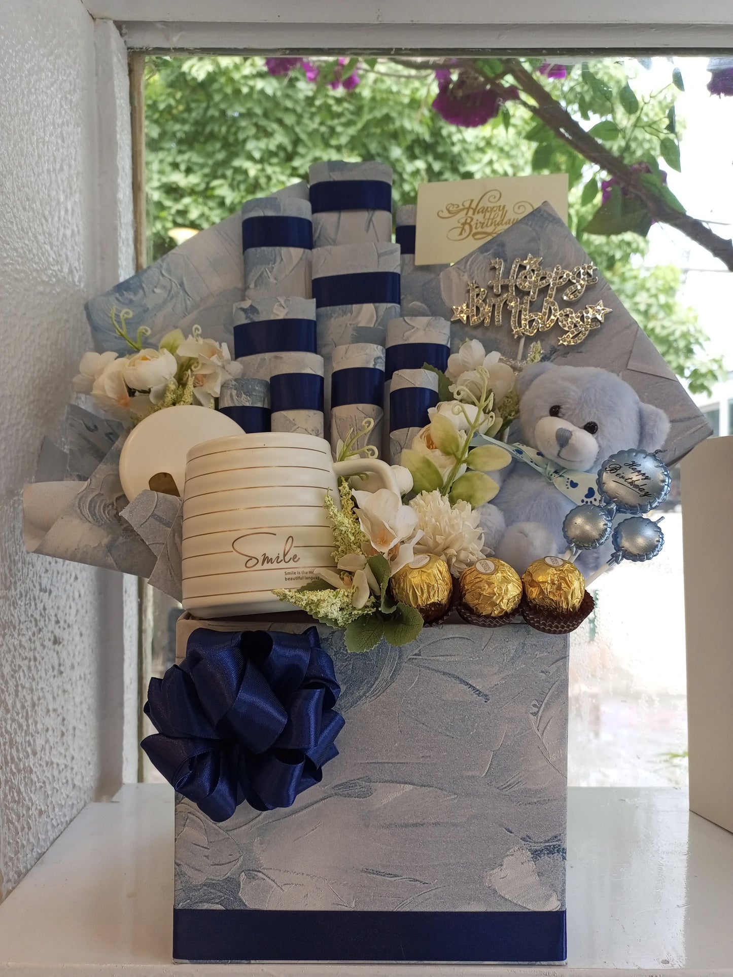 Chocolate basket with teddy bear and a cup
